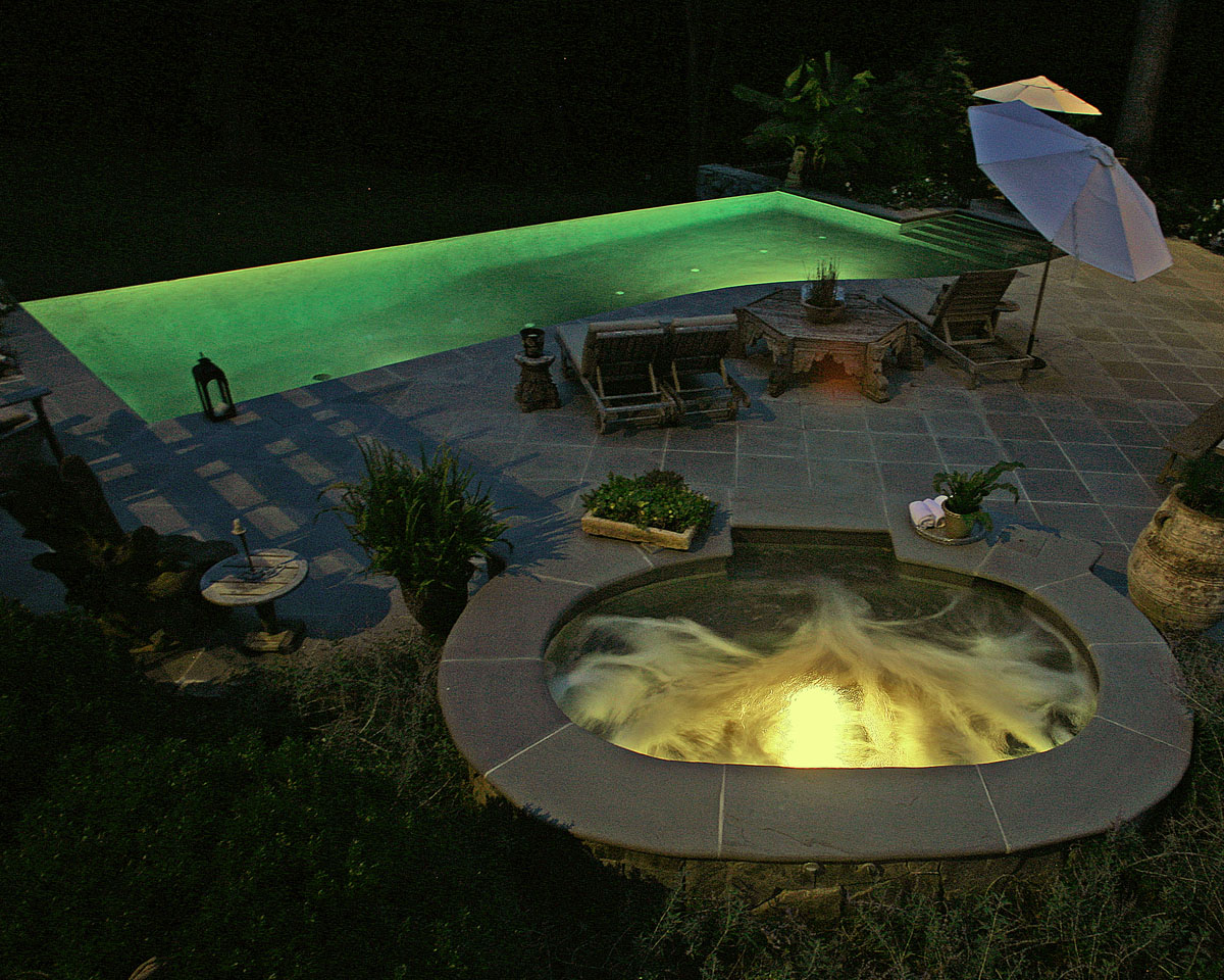 Custom in-ground pool with bubbler fountains